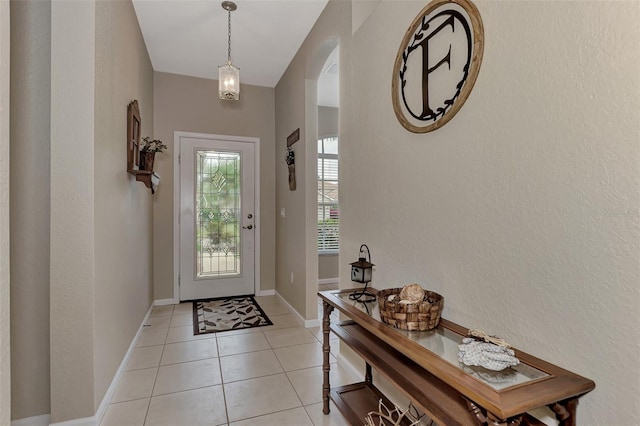 foyer entrance featuring light tile patterned floors