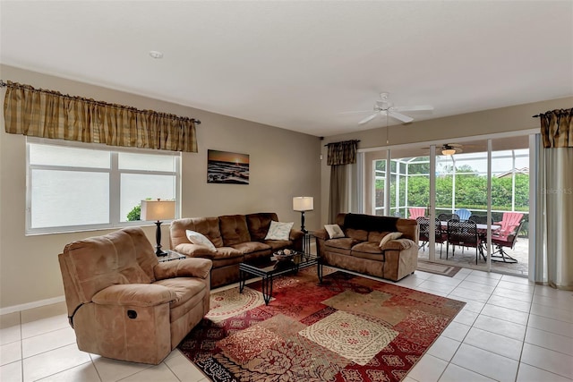 tiled living room with ceiling fan