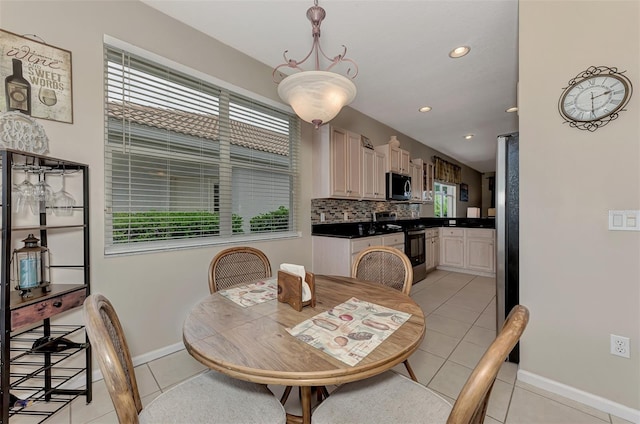 dining room featuring light tile patterned floors