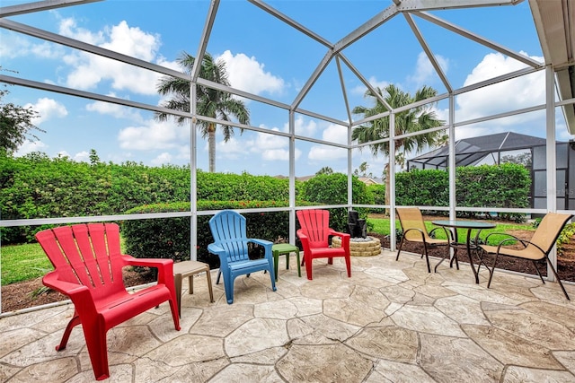 view of patio / terrace with a lanai