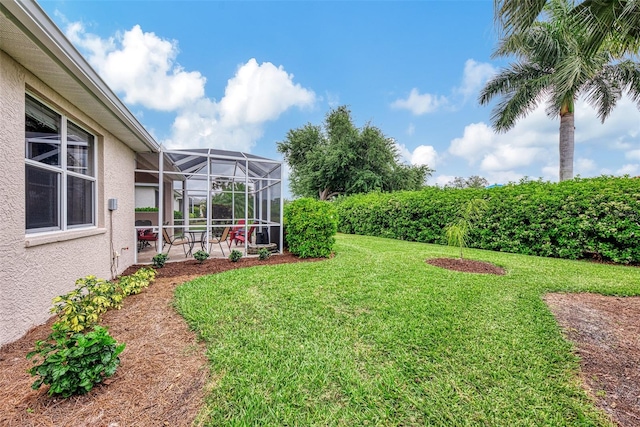 view of yard featuring a lanai and a patio