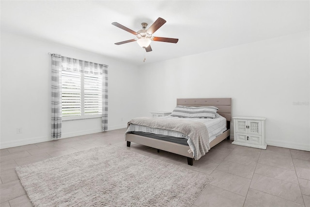 bedroom featuring ceiling fan and light tile patterned floors