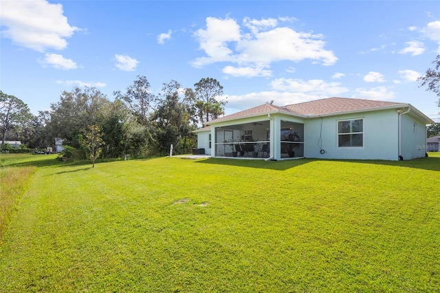 view of yard featuring a sunroom