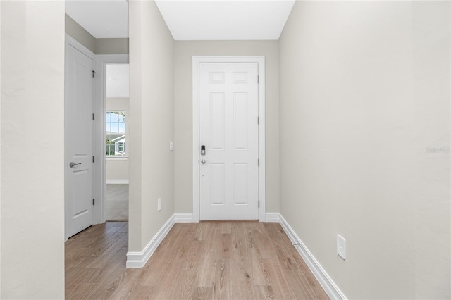 hallway featuring light hardwood / wood-style flooring