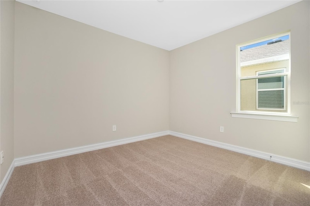 empty room with carpet flooring