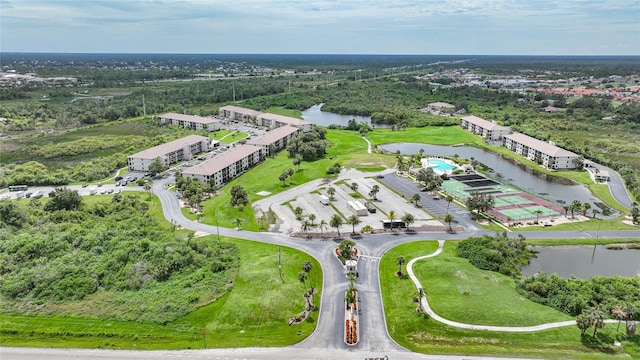 birds eye view of property featuring a water view