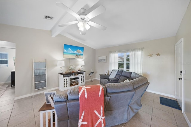 living room with lofted ceiling with beams, ceiling fan, and light tile patterned flooring