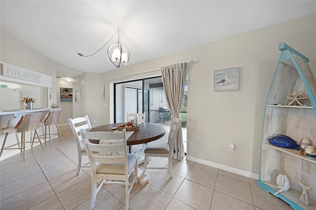 dining space with light tile patterned flooring, vaulted ceiling, and a notable chandelier