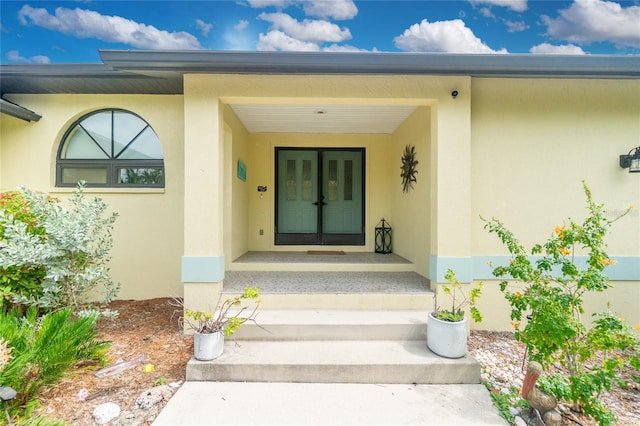 doorway to property featuring a porch