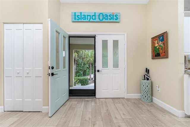 entrance foyer with light hardwood / wood-style floors