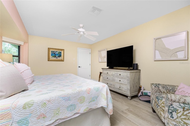 bedroom featuring ceiling fan and light hardwood / wood-style flooring