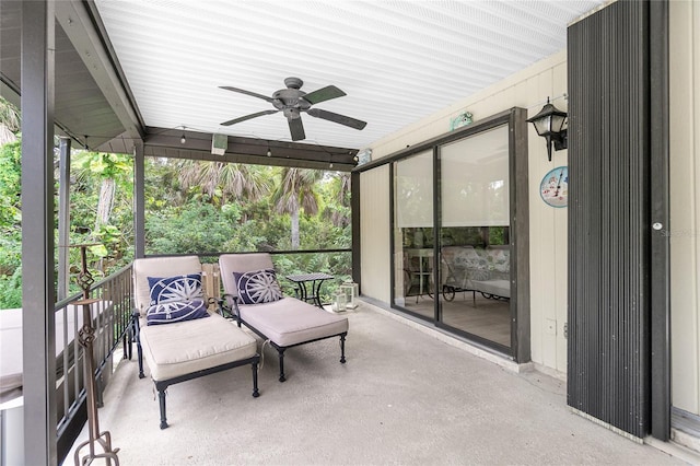 sunroom / solarium with ceiling fan