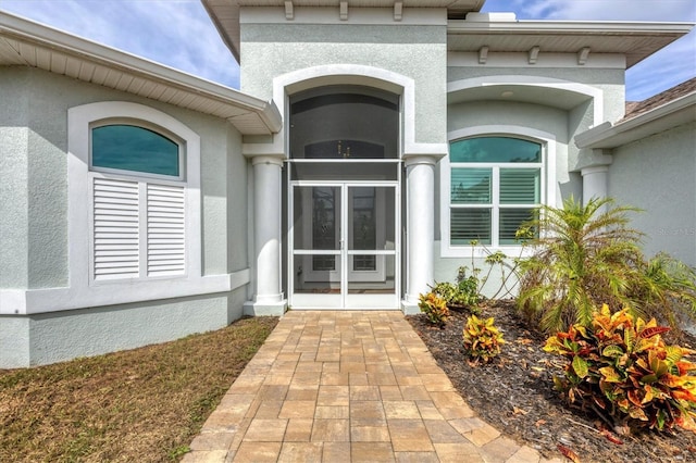 12194 Everglades Ave, Port Charlotte, FL 33981 - view of exterior entry with stucco siding