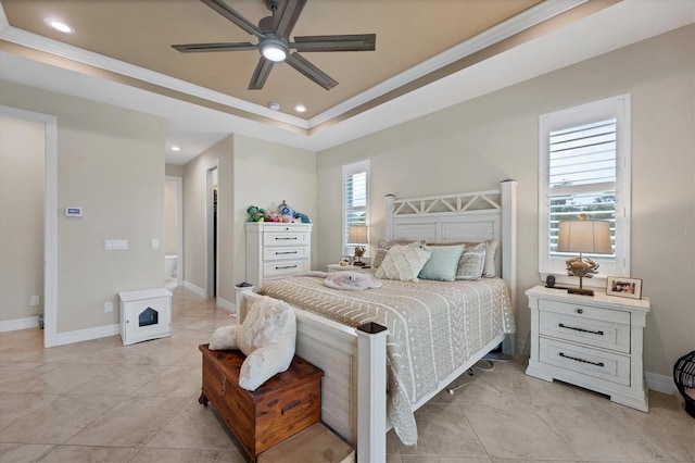 bedroom featuring multiple windows, a raised ceiling, ceiling fan, and crown molding