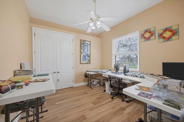 office area with ceiling fan and light hardwood / wood-style flooring