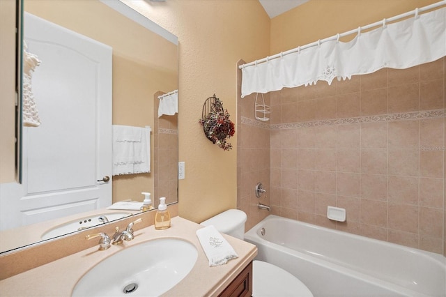 full bathroom featuring toilet, shower / tub combo with curtain, and vanity