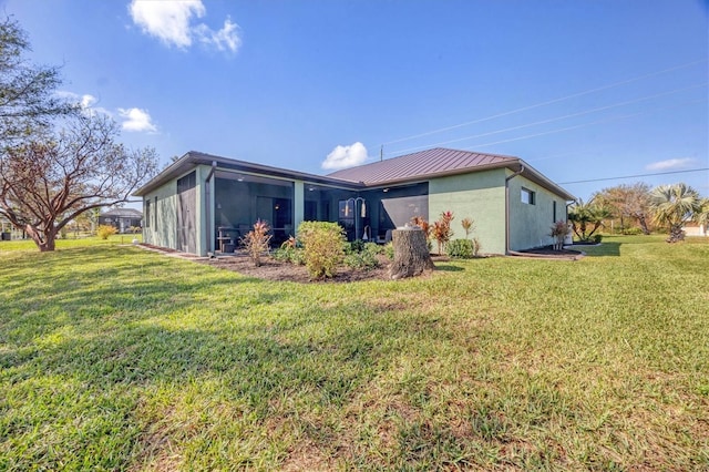 view of property exterior with a lawn