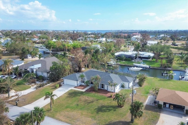 drone / aerial view featuring a water view