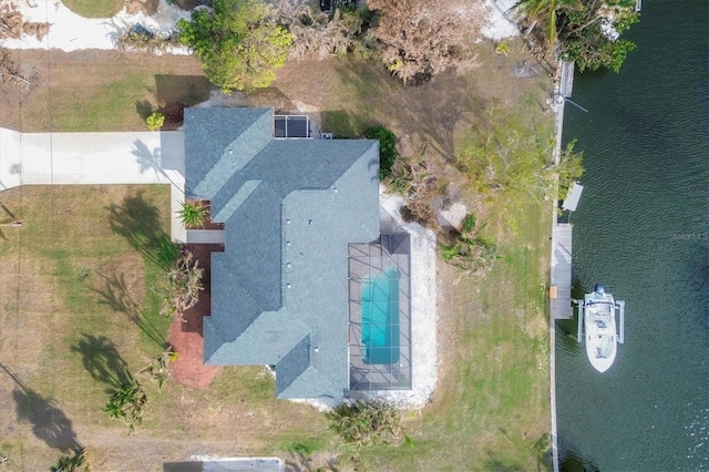 bird's eye view with a water view