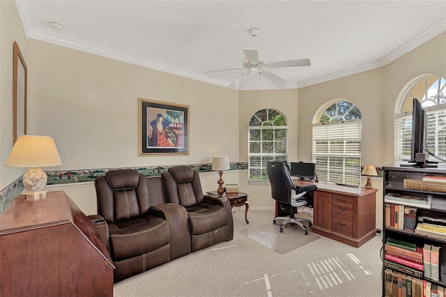 home office featuring ornamental molding and a healthy amount of sunlight