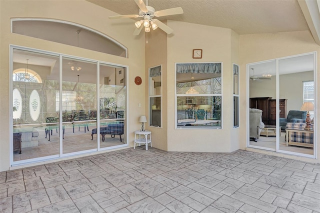 view of patio featuring ceiling fan