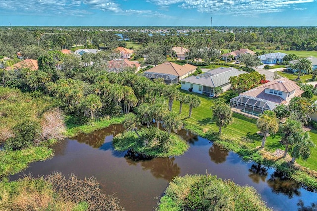 bird's eye view with a water view