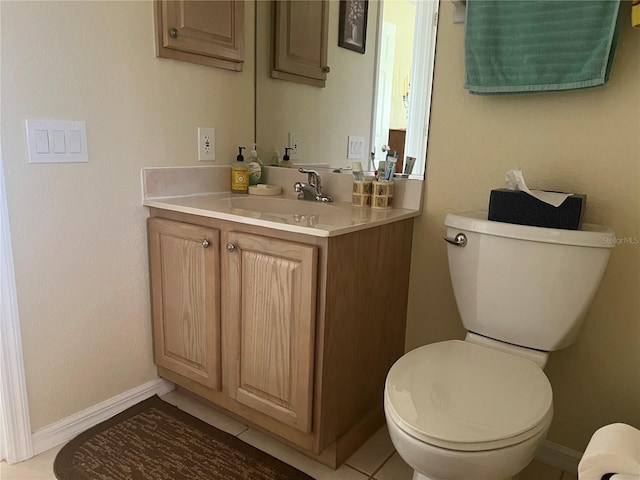 bathroom with tile patterned floors, toilet, and vanity