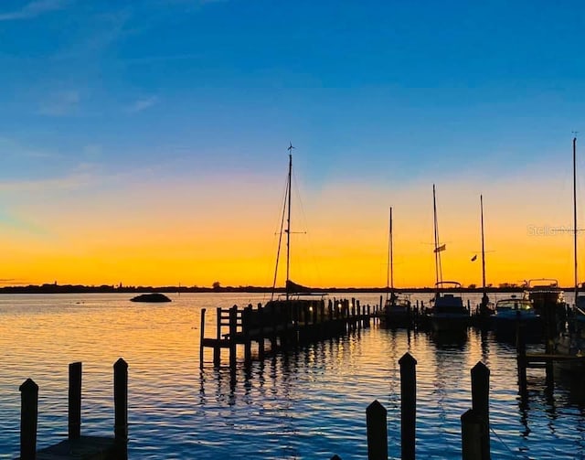 view of dock with a water view