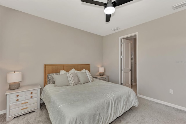 bedroom with light colored carpet and ceiling fan