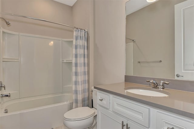 full bathroom featuring shower / bath combo, vanity, and toilet