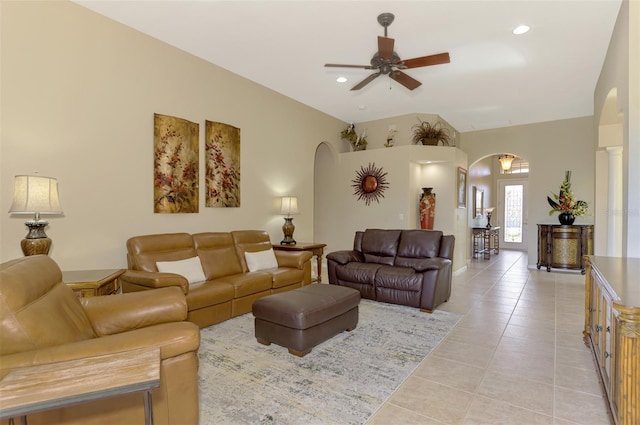 tiled living room featuring ceiling fan