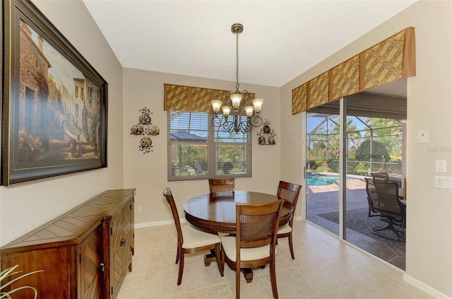 dining room featuring an inviting chandelier and light tile patterned floors