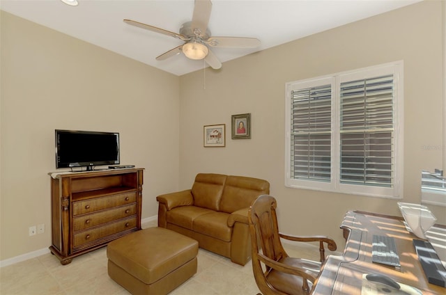 tiled living room featuring ceiling fan