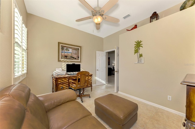 office featuring light tile patterned flooring and ceiling fan