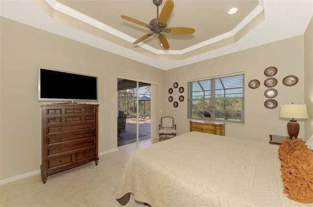 bedroom with ornamental molding, ceiling fan, access to exterior, light tile patterned floors, and a raised ceiling