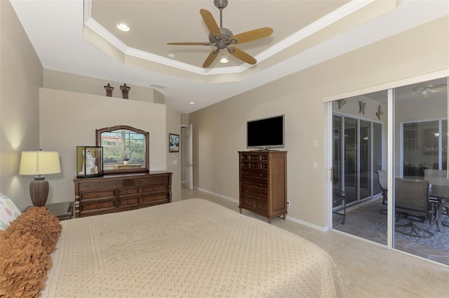 tiled bedroom with ceiling fan, a raised ceiling, access to exterior, and ornamental molding