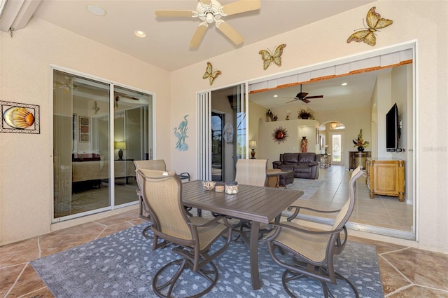 dining room with lofted ceiling with beams and ceiling fan