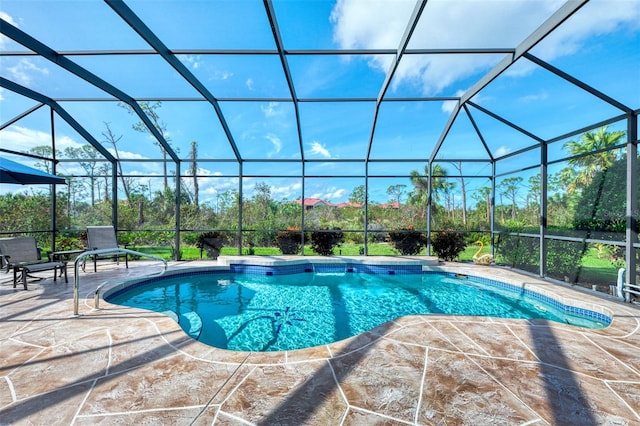 view of pool featuring a patio area and a lanai