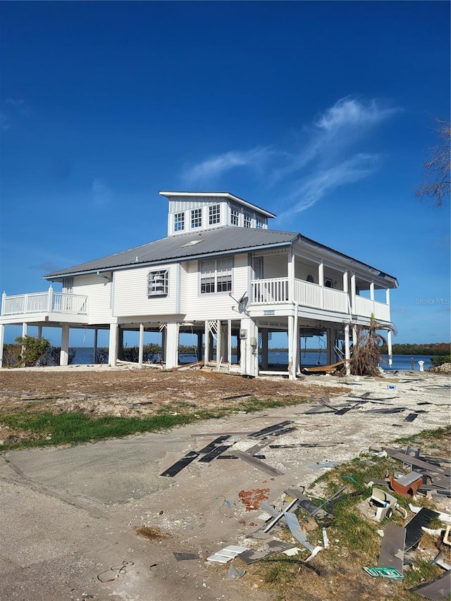 view of front of home featuring a water view