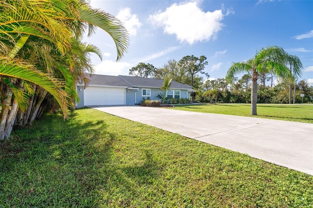 ranch-style house with a front yard and a garage