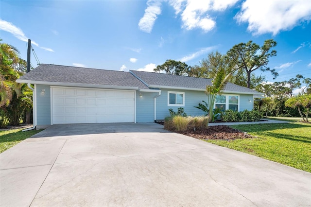 ranch-style house with a garage and a front yard