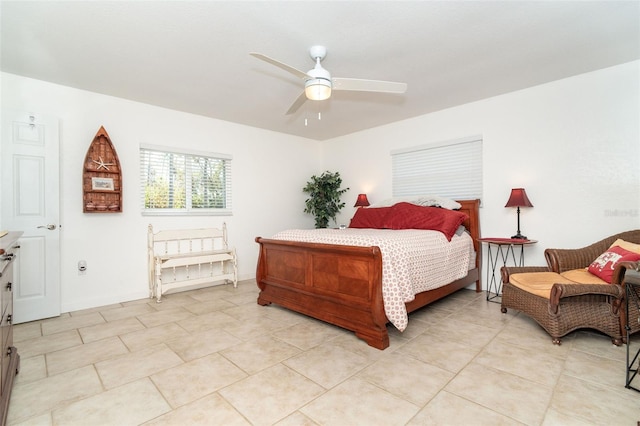 tiled bedroom with ceiling fan