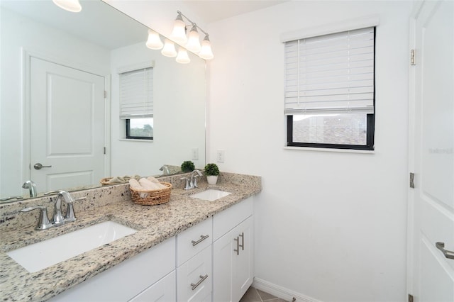 bathroom featuring vanity and tile patterned flooring