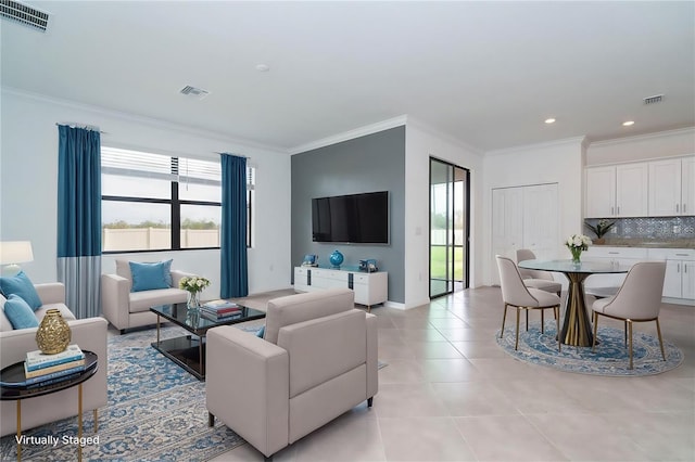 living area with visible vents and plenty of natural light