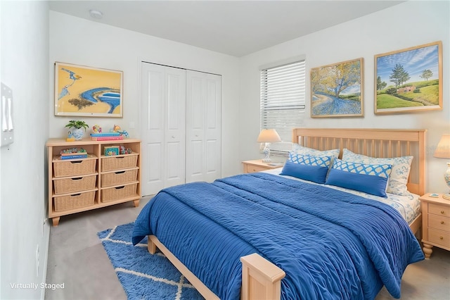 carpeted bedroom with a closet