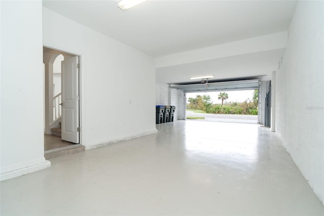 garage featuring baseboards