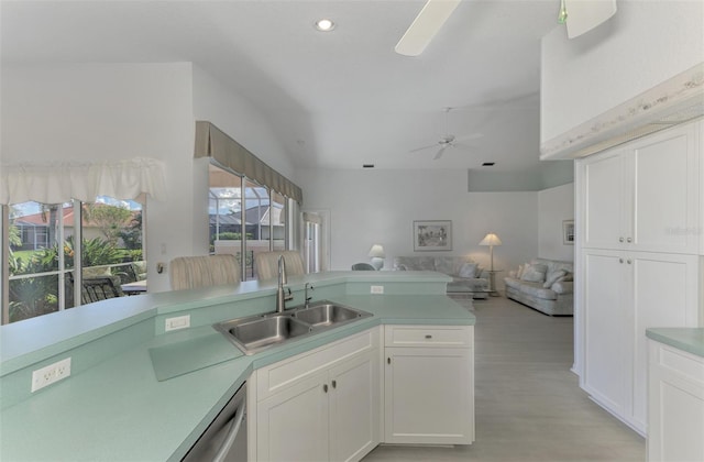 kitchen featuring ceiling fan, dishwasher, sink, light hardwood / wood-style flooring, and white cabinets