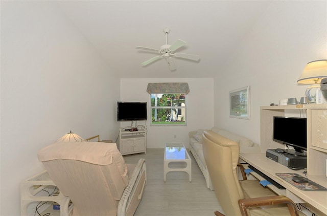 living room with light carpet and ceiling fan