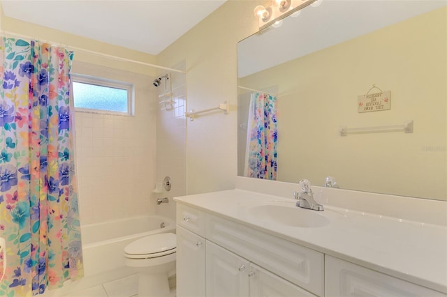 full bathroom featuring tile patterned floors, vanity, toilet, and shower / bath combo