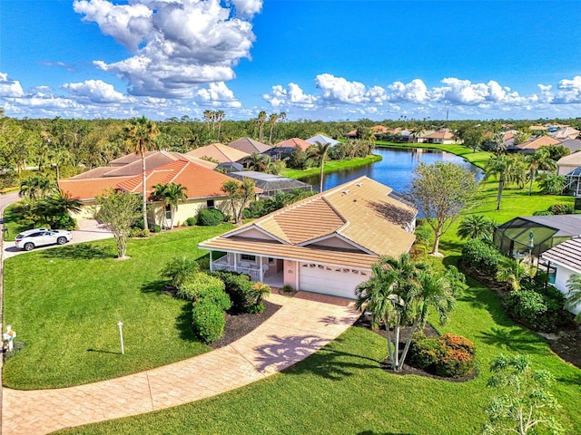 drone / aerial view with a water view